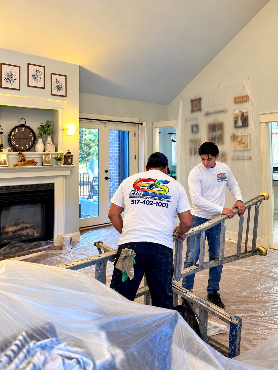 Exit Strategies Property Solutions crew assembling access equipment in a furnished DeWitt, Michigan living room with floors and furnishings protected