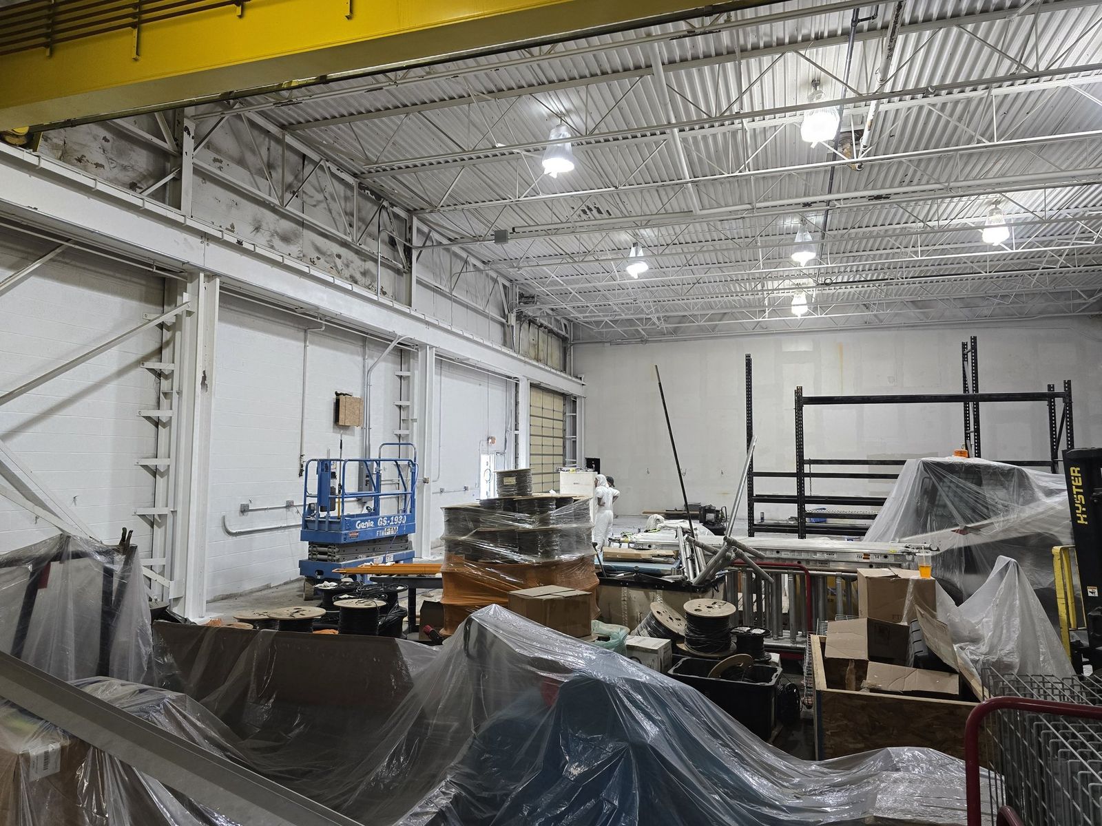 Commercial warehouse interior with coated steel structure and ceiling